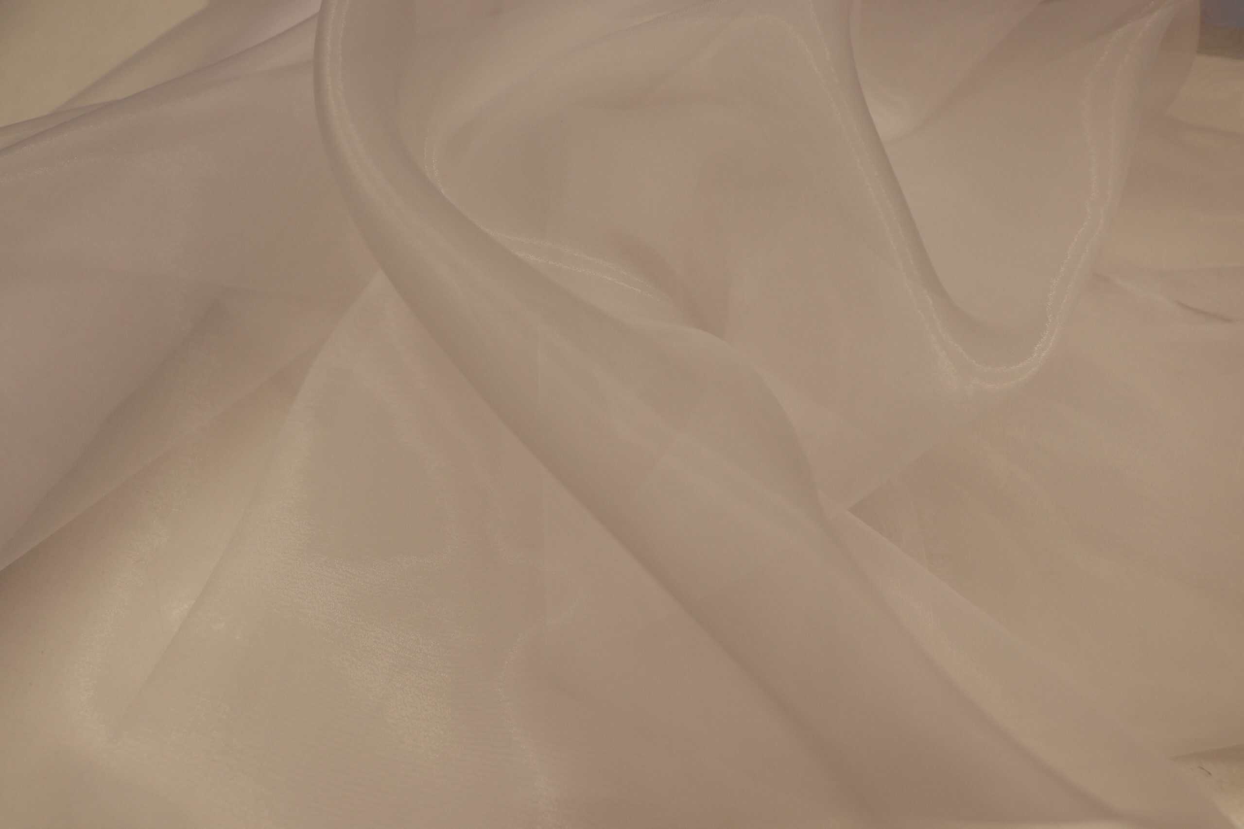 Luxurious silk fabric with smooth texture and elegant drape, ideal for high-end textiles and fashion.