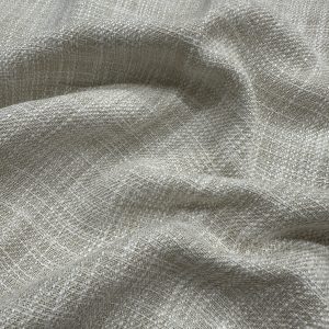 Light beige linen fabric with a subtle textured weave, ideal for upholstery and home decor projects.