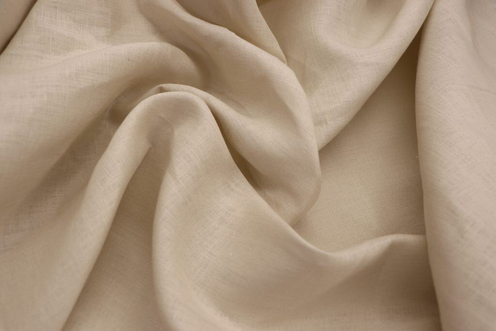 Pure linen fabric in natural beige, showcasing high-quality 165GSM material.