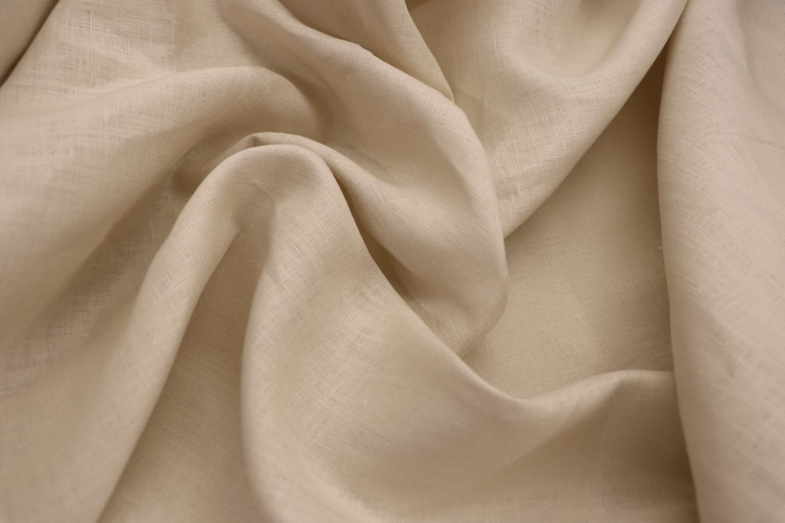 Pure linen fabric in natural beige, showcasing high-quality 165GSM material.