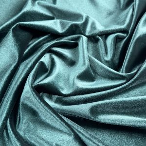 Luxurious teal velvet spandex heavyweight fabric for upholstery and fashion.