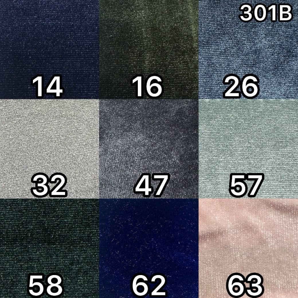 Colorful velvet spandex fabrics in various shades and textures.