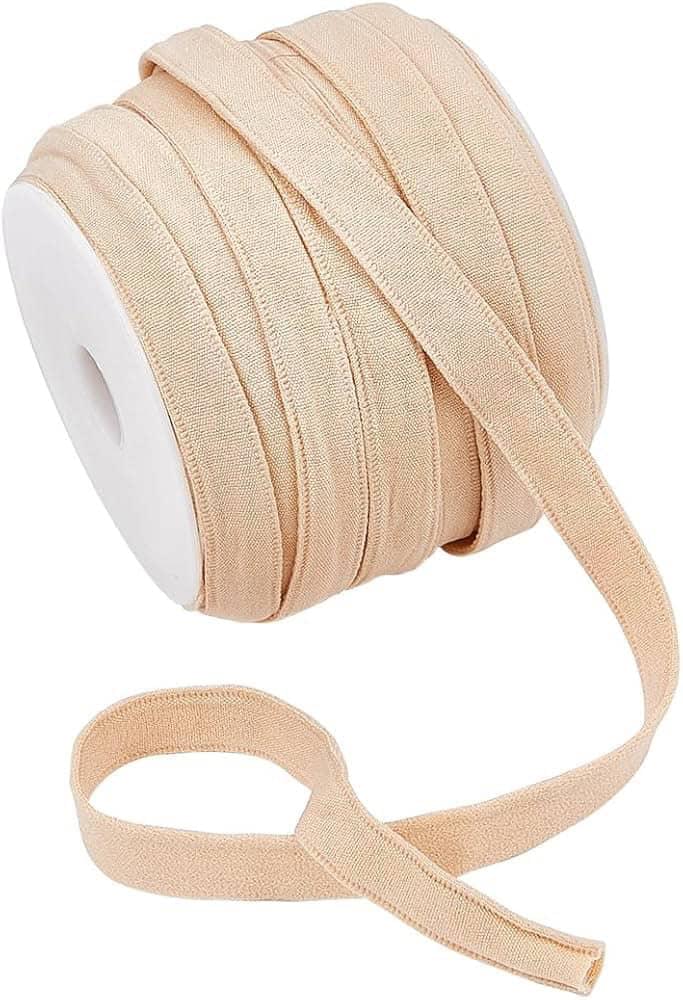 Beige boning cover fabric for dressmaking and tailoring.